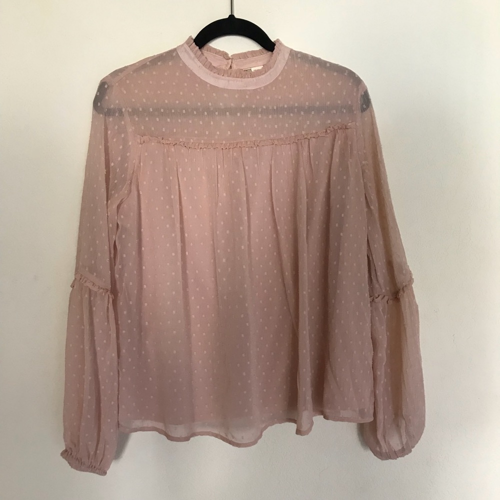Light pink frilly blouse